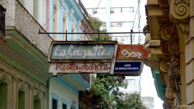 Old, rusted, colorful neon sign for Lafayette Restaurante and Bar, La Habana Vieja, Havana, Cuba
