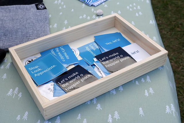 Popular and free to anyone walking by: Happier Place slogan stickers.