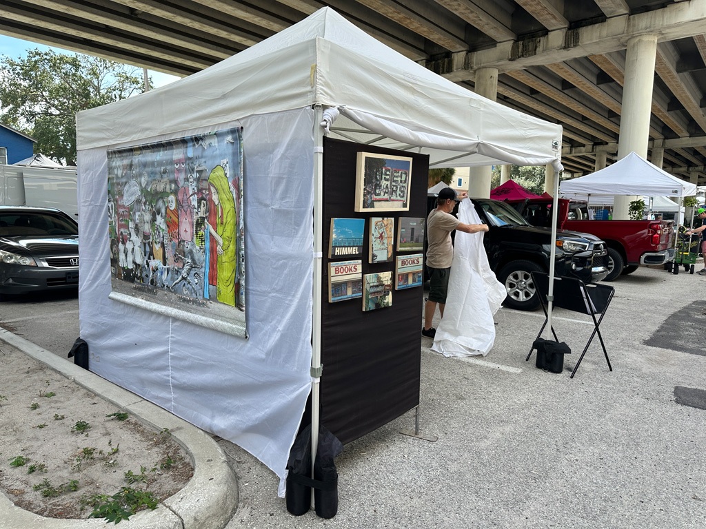 setting up booth at art fair, street art photography, wood transfer, urbex